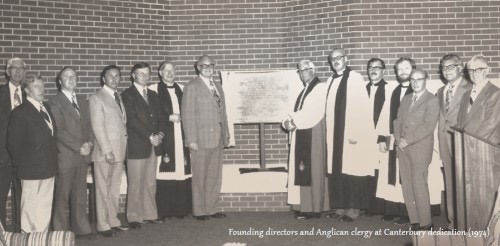 Historical photo of Canterbury Foundation's founding directors and Anglican clergy at the 1971 dedication ceremony